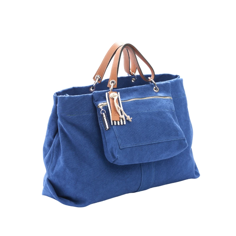 sac modulable en coton bleu roi, pour le week-end, avec des anses en cuir naturel et sa pochette equipier en coton bleu roi