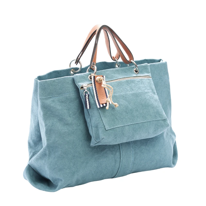 sac modulable en coton bleu français, pour le week-end, avec des anses en cuir naturel et sa pochette equipier en coton bleu français
