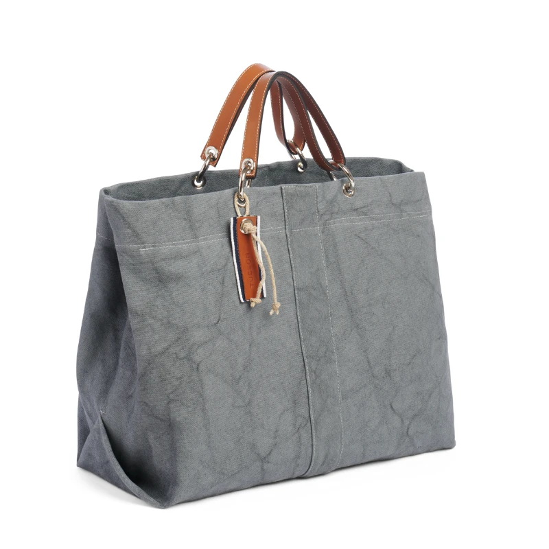 grand sac modulable en coton gris, pour le week-end, avec des anses en cuir naturel et sa pochette equipier en cuir gold et sa pochette en coton bleu français
