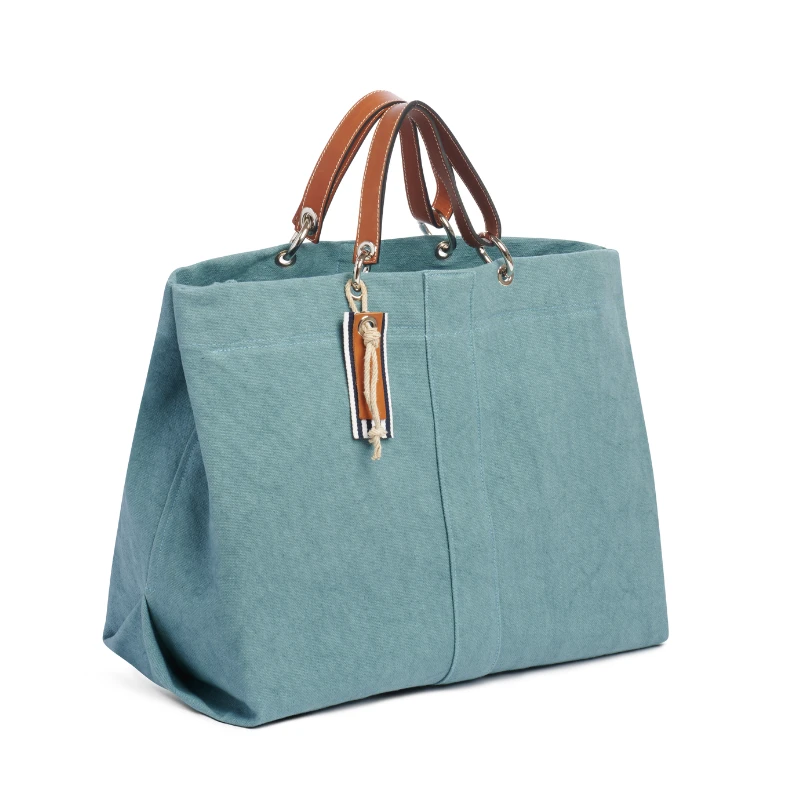 sac modulable en coton bleu français, pour le week-end, avec des anses en cuir naturel
