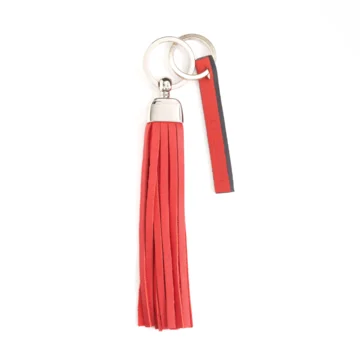 porte-clés pompon en cuir corail