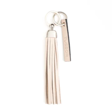 porte-clés pompon en cuir ecru