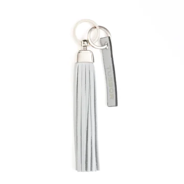 porte-clés pompon en cuir gris clair